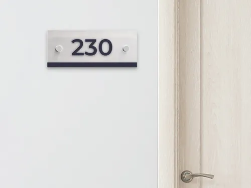 Acrylic address sign with clear, bold lettering and a sleek design. Durable and ideal for both residential and commercial use