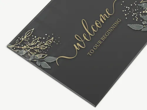 Black transparent acrylic sign with custom lettering and a modern, sleek design. Durable and suitable for both indoor and outdoor use