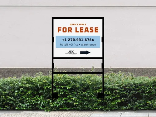 White office space for lease H-frame sign with red text and phone number.