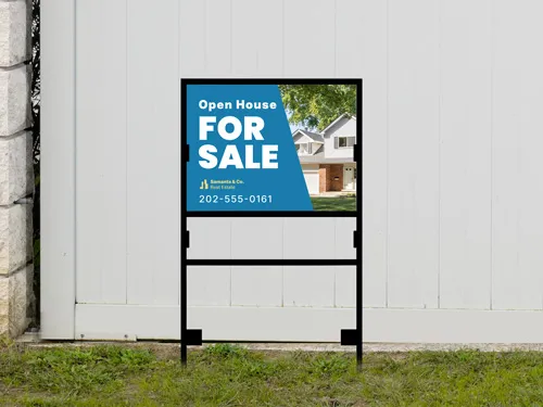 Blue and white for sale H-frame sign with house photo on black metal frame