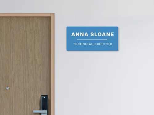 Sleek PVC sign with a professional nameplate design, featuring bold text on a clean background, ideal for office doors or desks