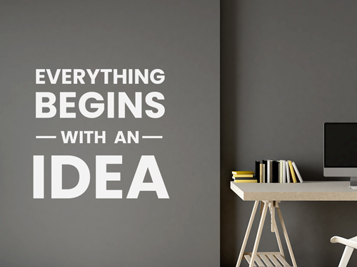 Office wall vinyl lettering displaying an inspirational quote.