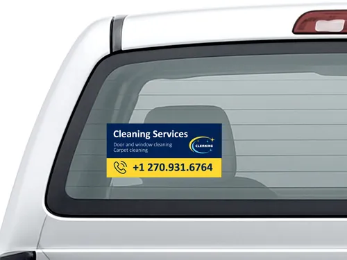 Opaque truck window decal material with a company's information.