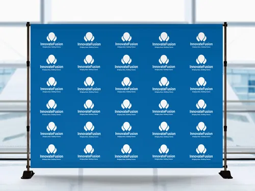 Step and repeat photo backdrop on a blue background featuring logo and brand name.
