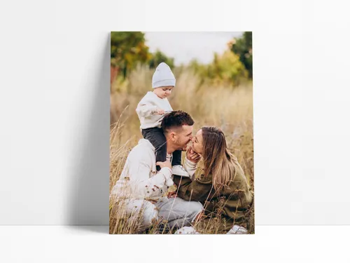 Personalized foam board sign featuring a warm outdoor family portrait with natural lighting and a soft, autumnal background