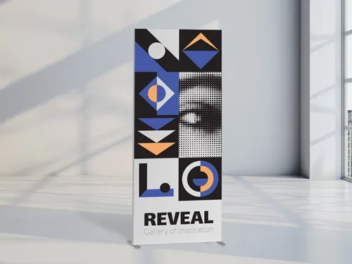 Vivid SEG fabric display with geometric shapes for trade shows.