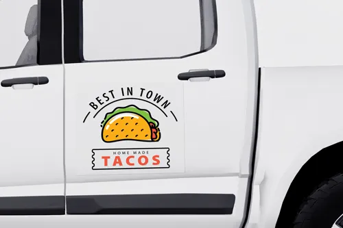 Best In Town Tacos truck decal displayed on the side door with bold, eye-catching design.
