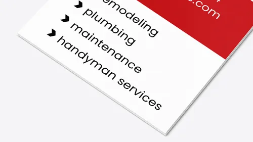 Clean foam board sign with a red and white layout, listing remodeling, plumbing, maintenance, and handyman services in bold black text