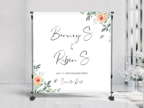 Wedding-themed step and repeat banner with decorative elements.