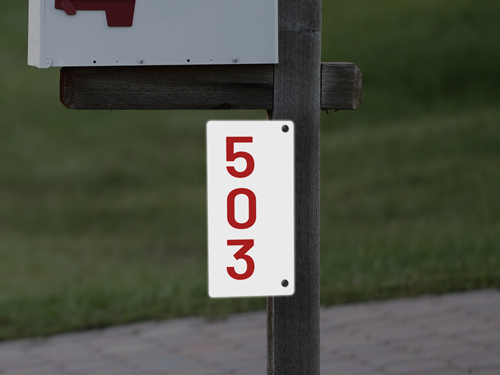 Reflective aluminum sign with a clean white background and bold black road number, designed for easy identification on highways and routes