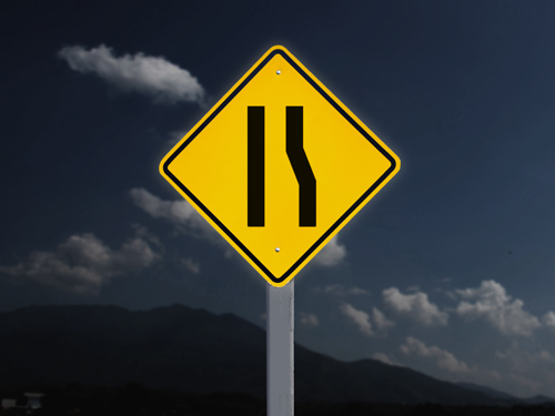 Durable reflective aluminum sign with a classic road sign design, featuring directional arrows and symbols for clear traffic guidance